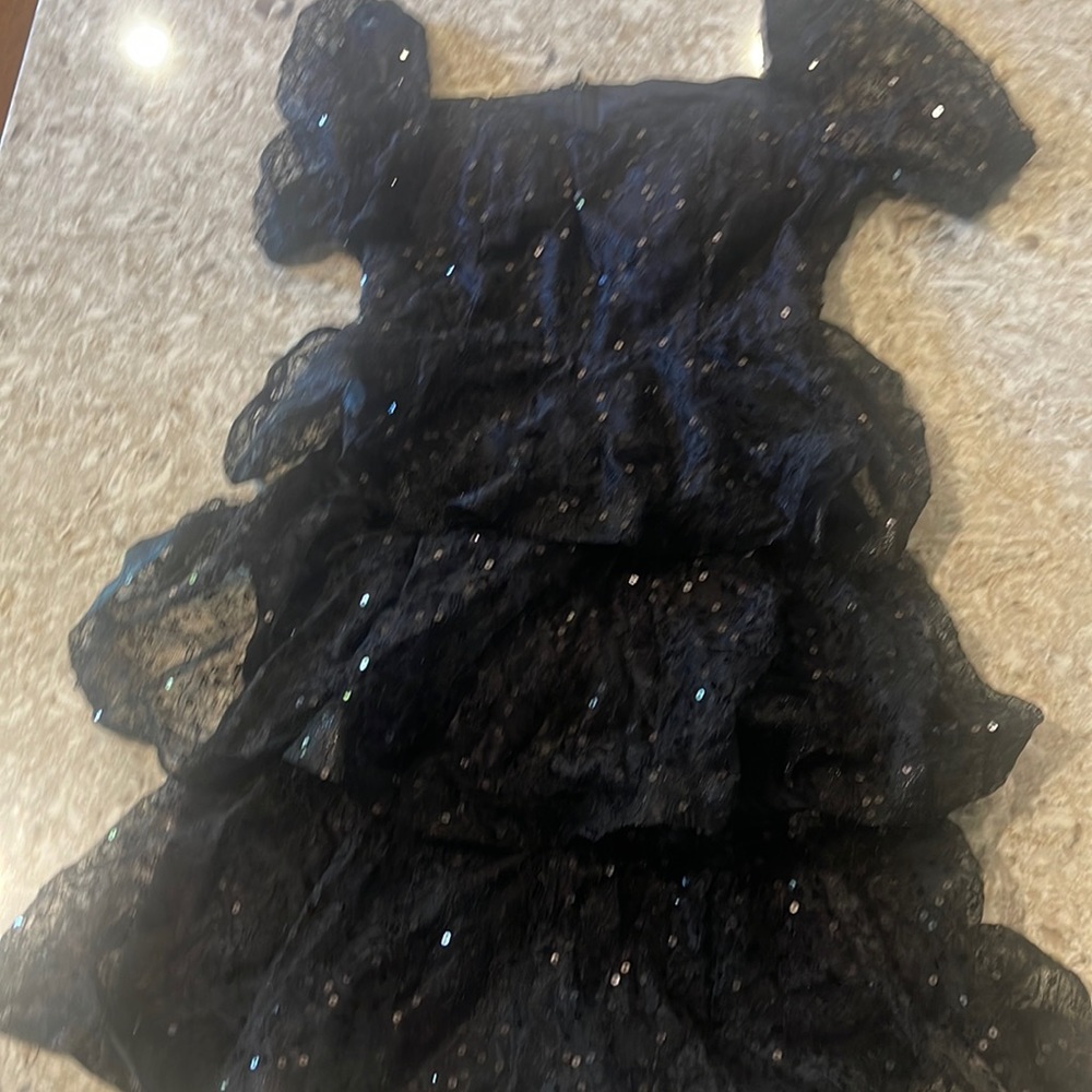 Miss ORD little black dress.  Sequins and ruffle